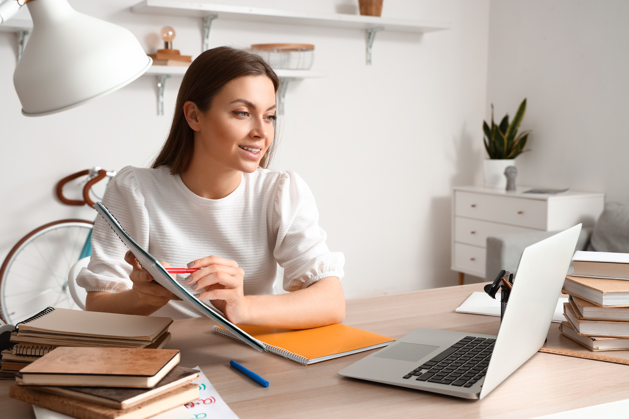 Tutor Giving Lesson Online at Home